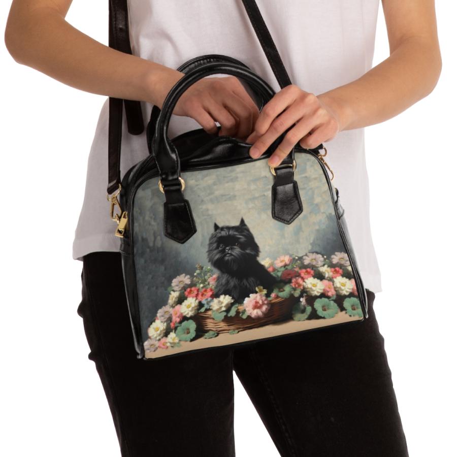 Affenpinscher handbag on person