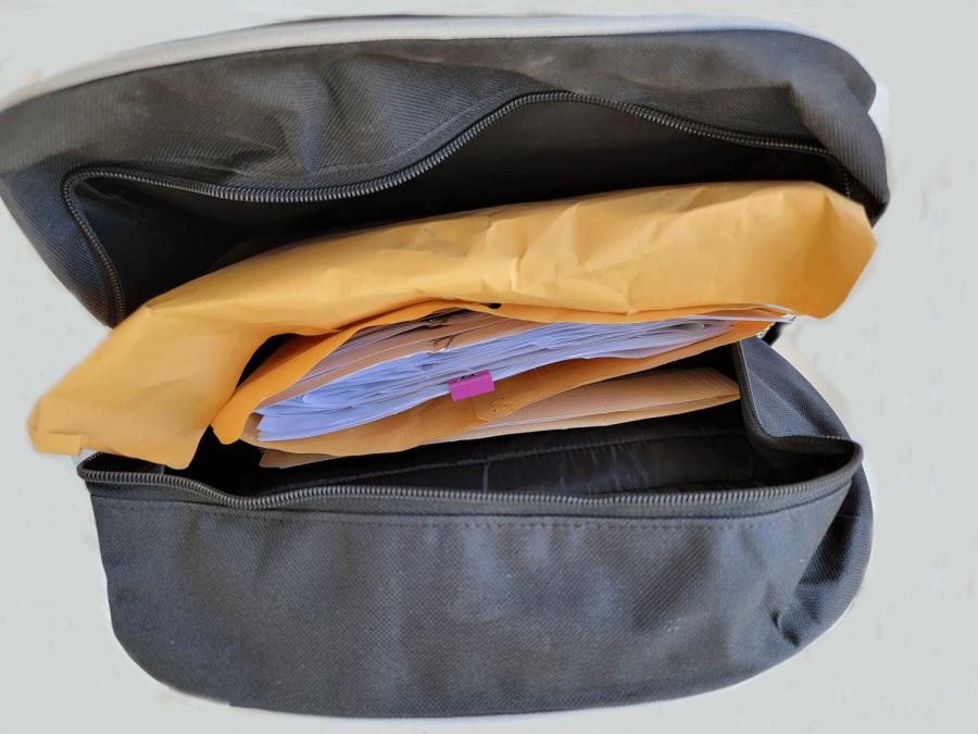 backpack open with supplies