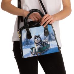 Alaskan Mal handbag on person